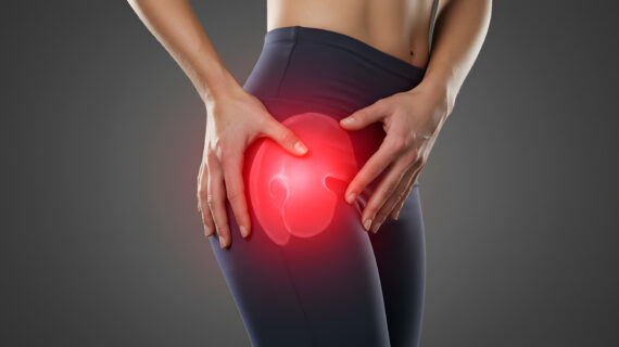Illustration of hip joint pain in woman, highlighting a common area affected by posture misalignment.